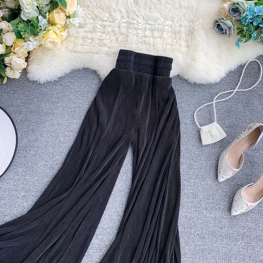 Flared fishtail stretch pleated trousers with ruffles