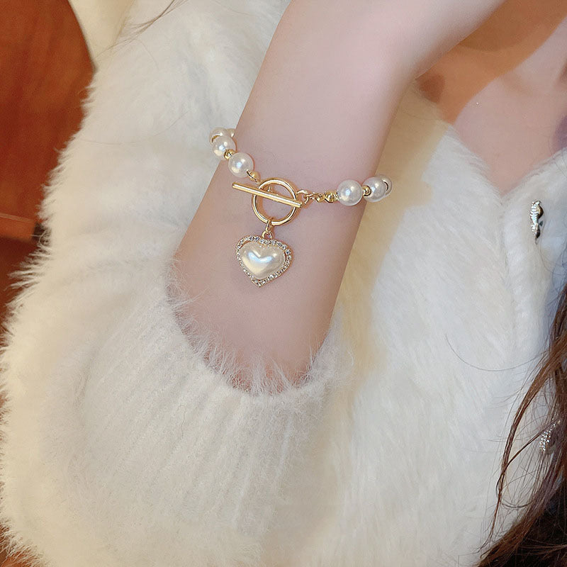 Bracciale con cuore di perle e fibbia con diamanti