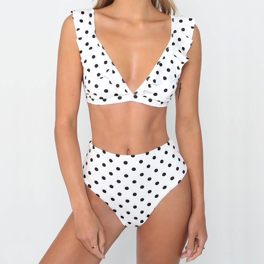 Swimsuit with black and white polka dot print