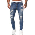 Jeans Skinny Strappati da Uomo