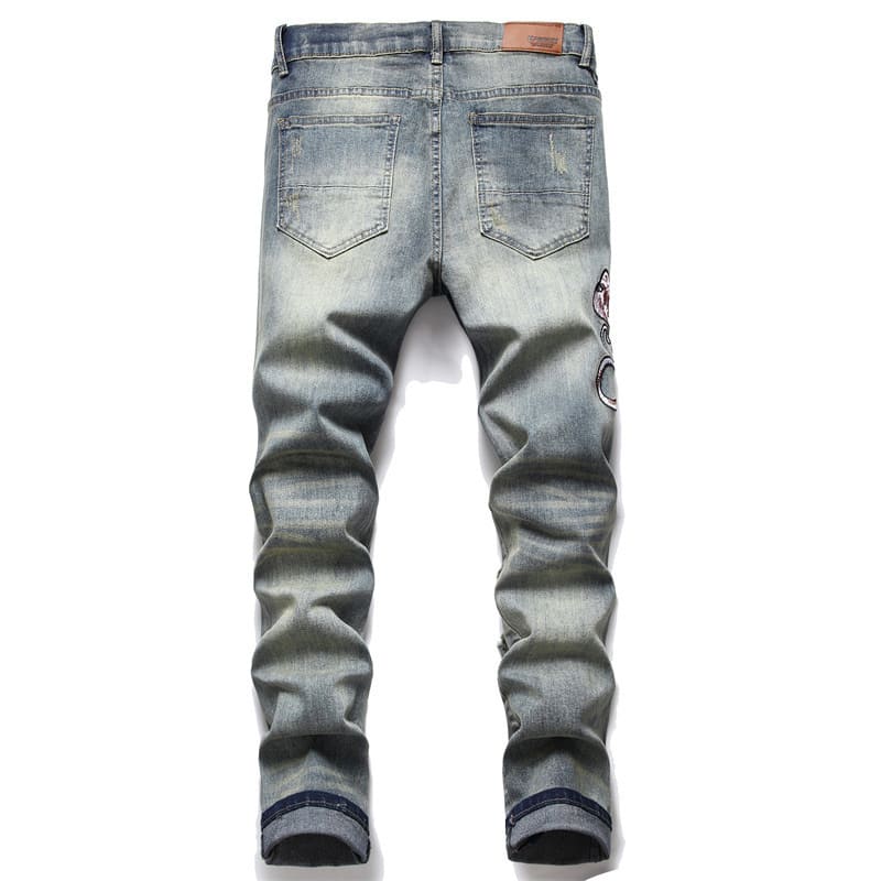 Jeans sfilacciati a mano da uomo