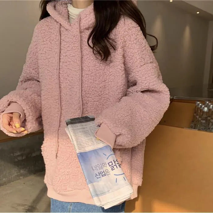 Maglione con orecchie da orso