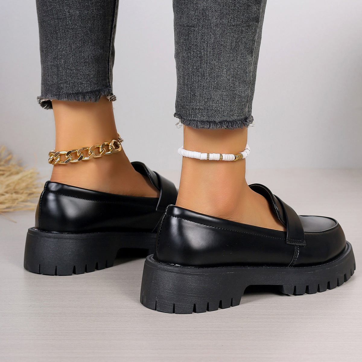 Black platform loafers