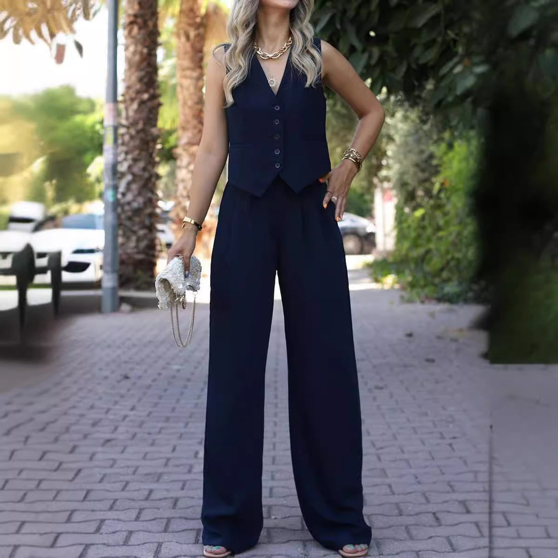 Sleeveless vest with loose fitting trousers