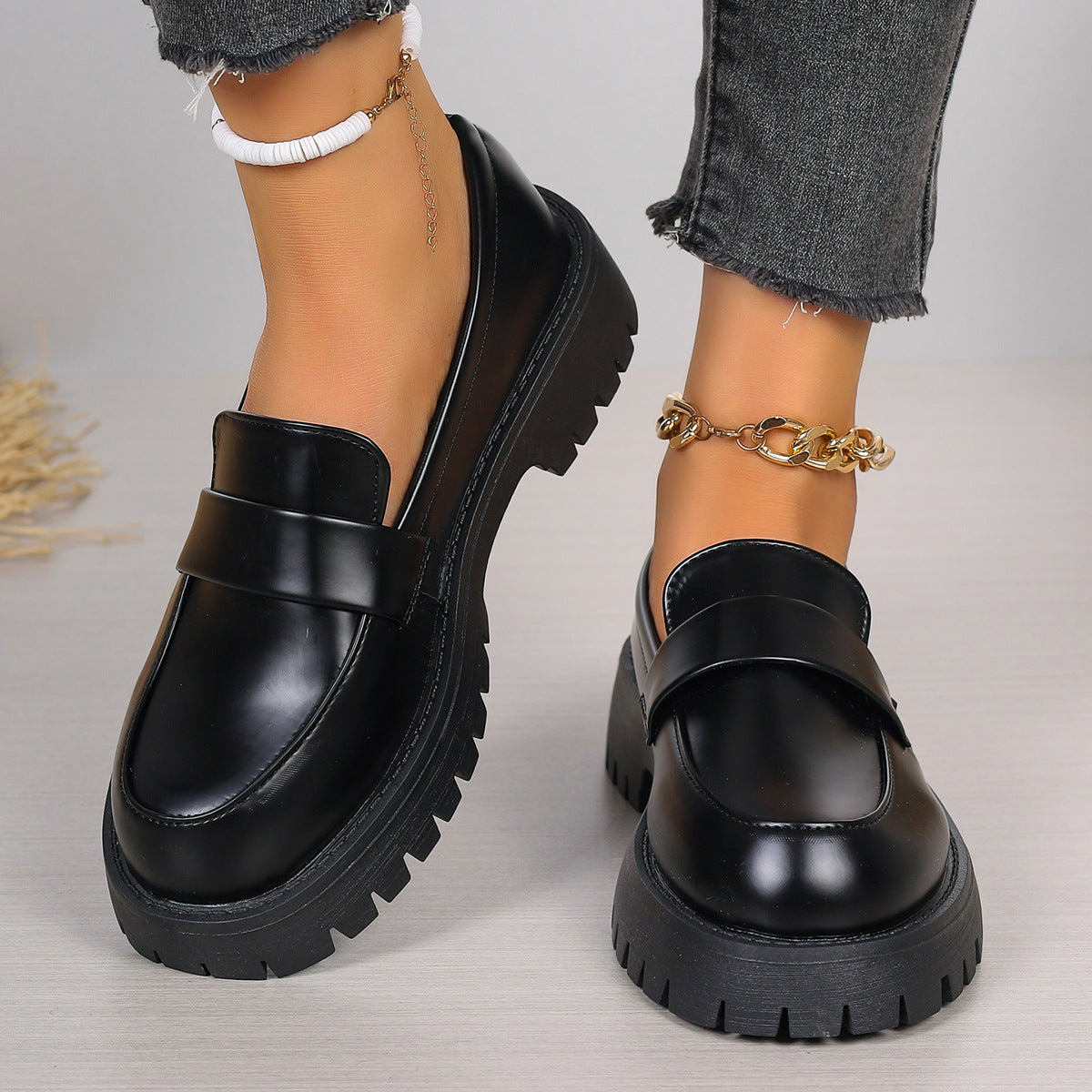 Black platform loafers