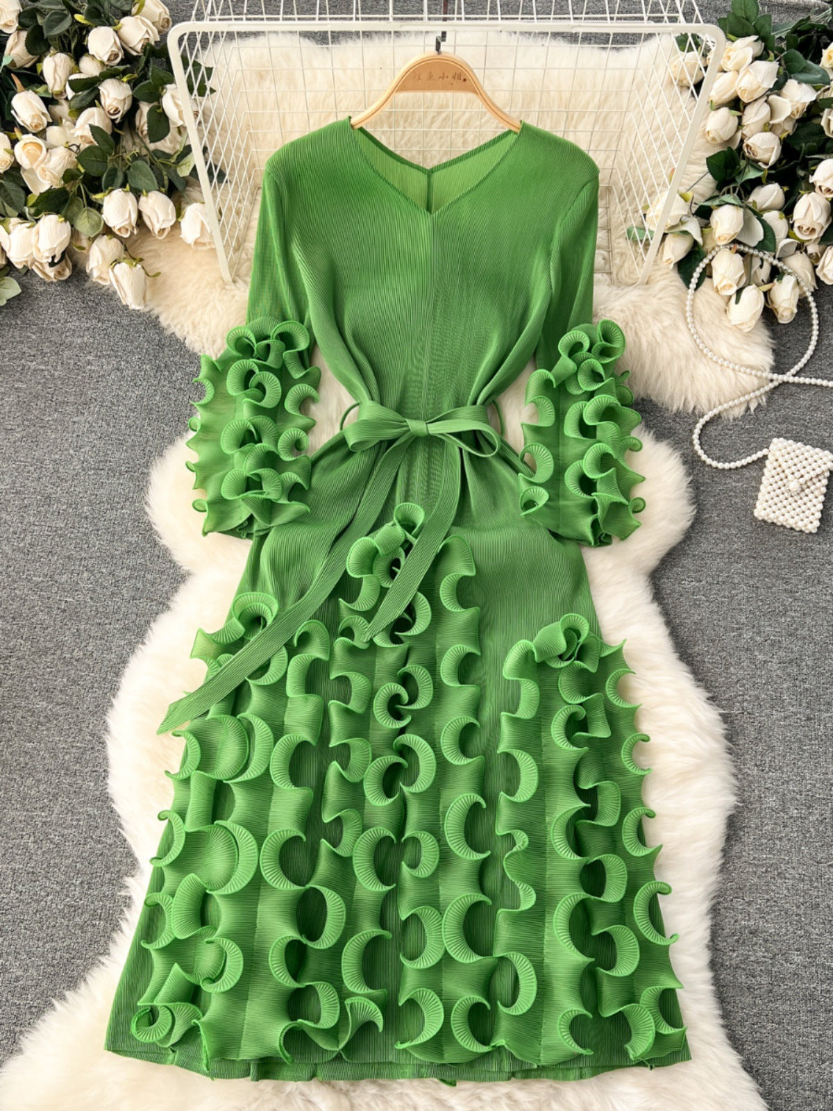Dress with three-dimensional gathered design