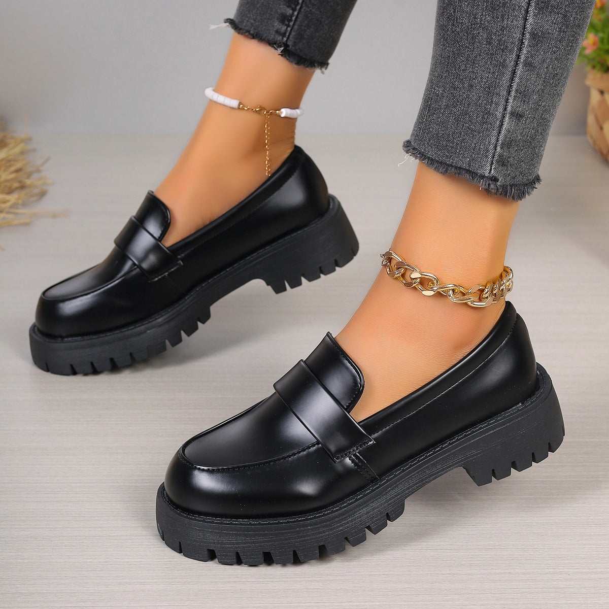 Black platform loafers