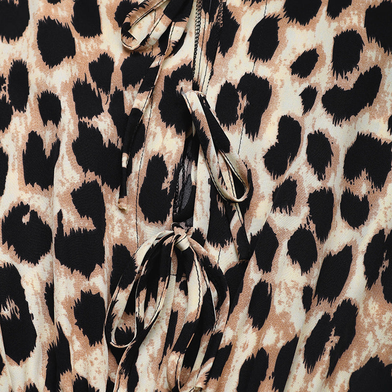 Tuta intera leopardata con nodo e vita alta