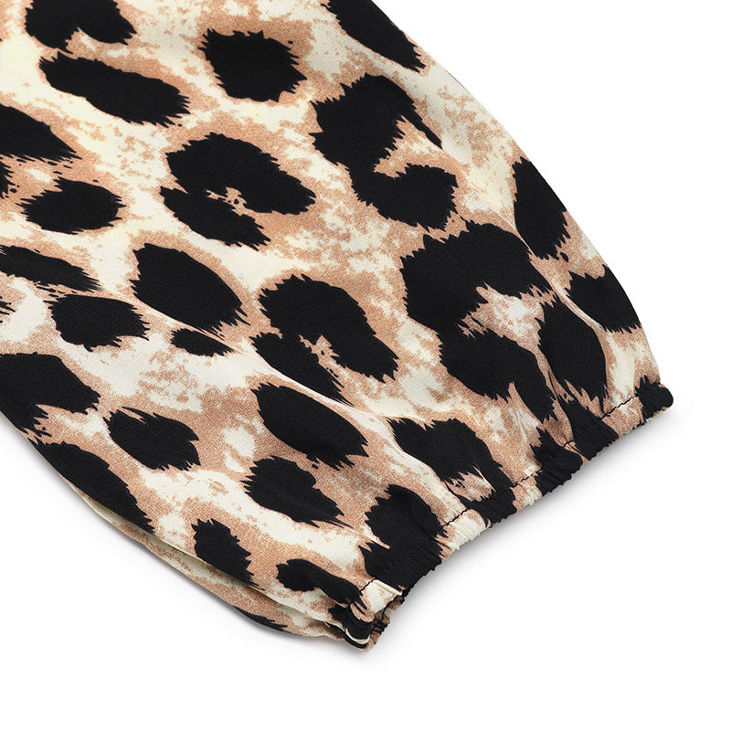 Tuta intera leopardata con nodo e vita alta