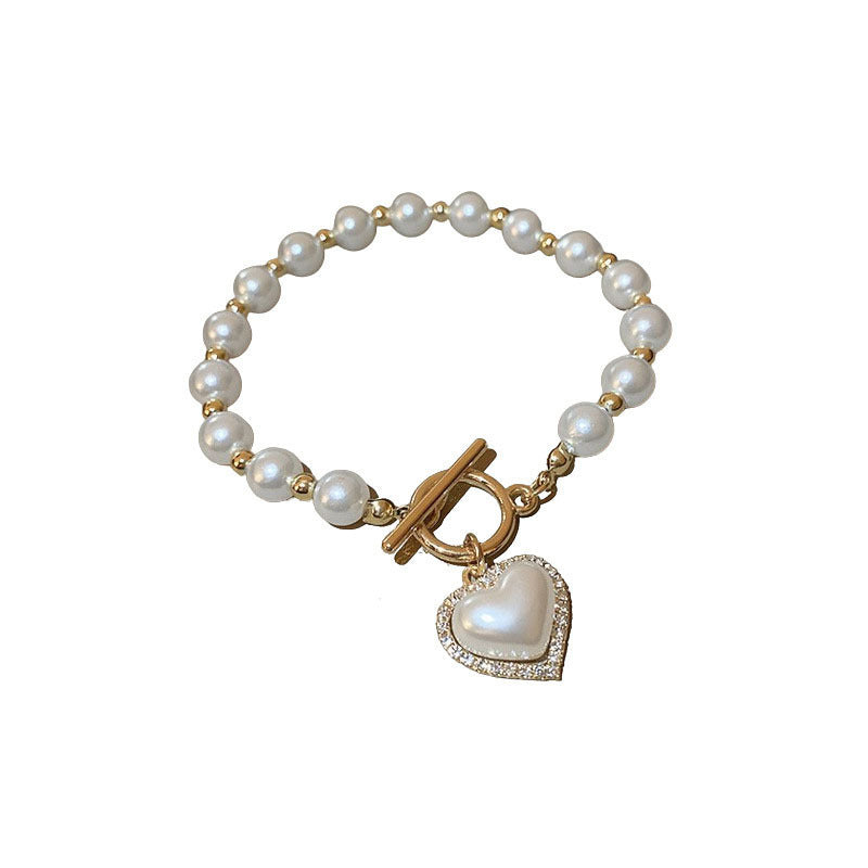 Bracciale con cuore di perle e fibbia con diamanti