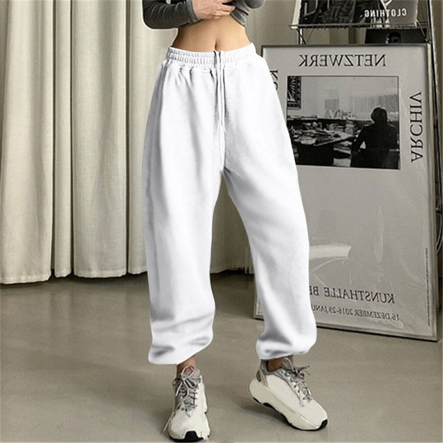 Pantaloni sportivi da donna allacciati alla caviglia,