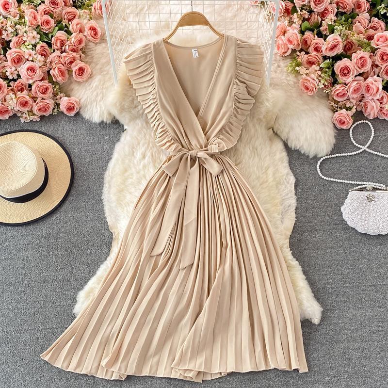 Pleated dress with V-neck